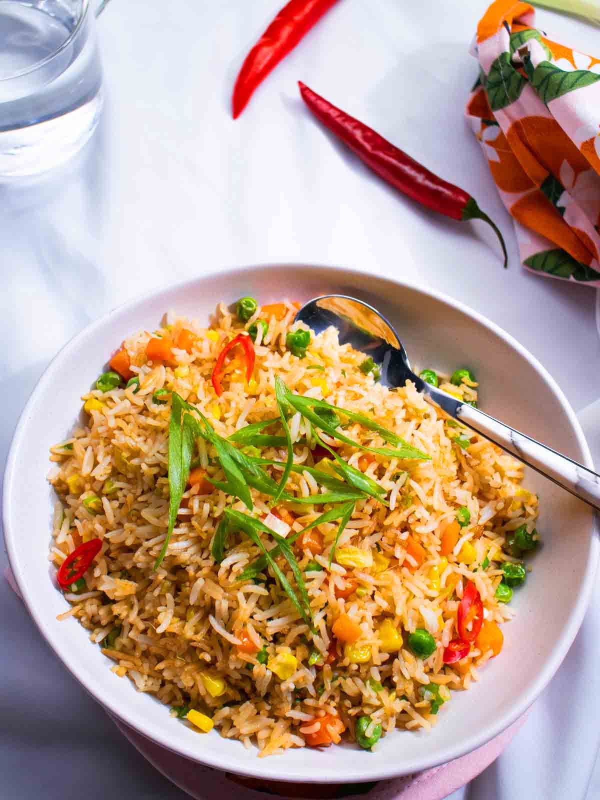 a bowl of fried rice on the table