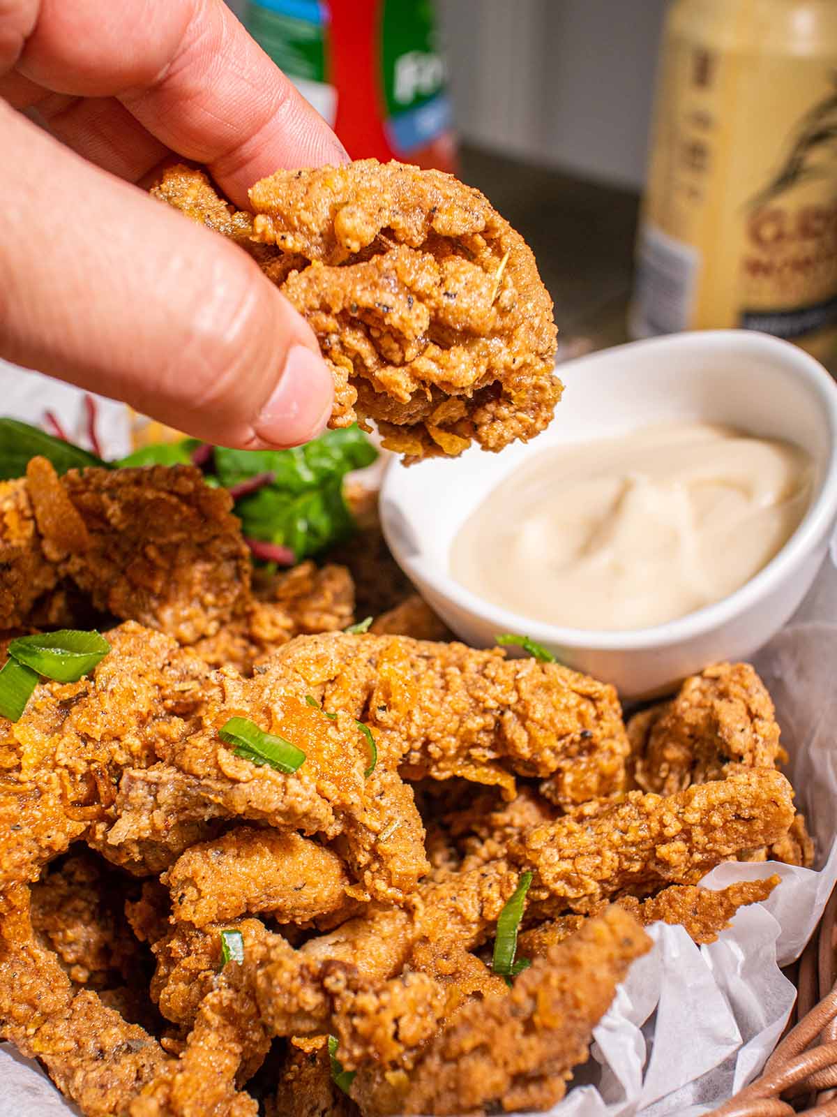 pick up a piece of fried oyster mushrooms (vegan fried chicken)