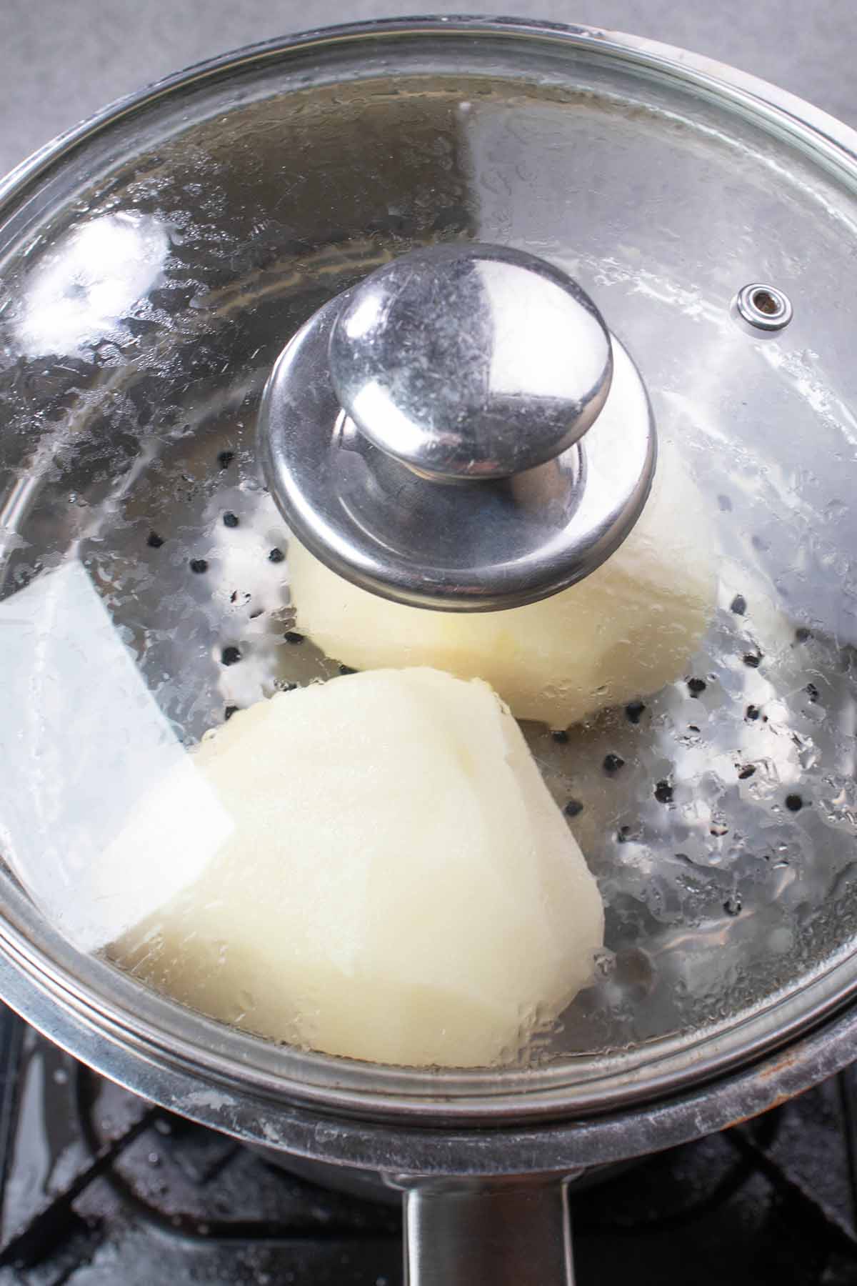 steaming two potatoes