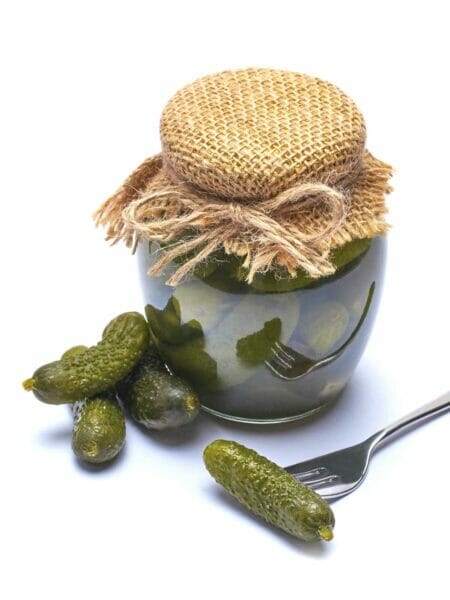 a jar of cornichon pickles