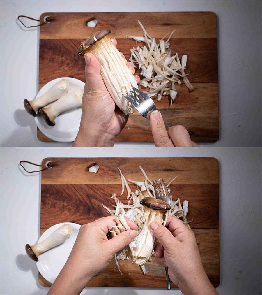 shred king oyster mushroom by a fork